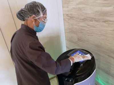 机器人送餐，26步深度清洁 揭秘‘无接触服务’酒店的安心守护